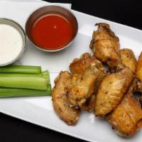 District Wings · Served with celery and your choice of ranch or bleu cheese dressing. Sauces served on the si...