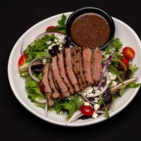 Steak 'N Blue · Field greens with thin sliced beef let, red onion, grape tomatoes and blue cheese crumbles. ...