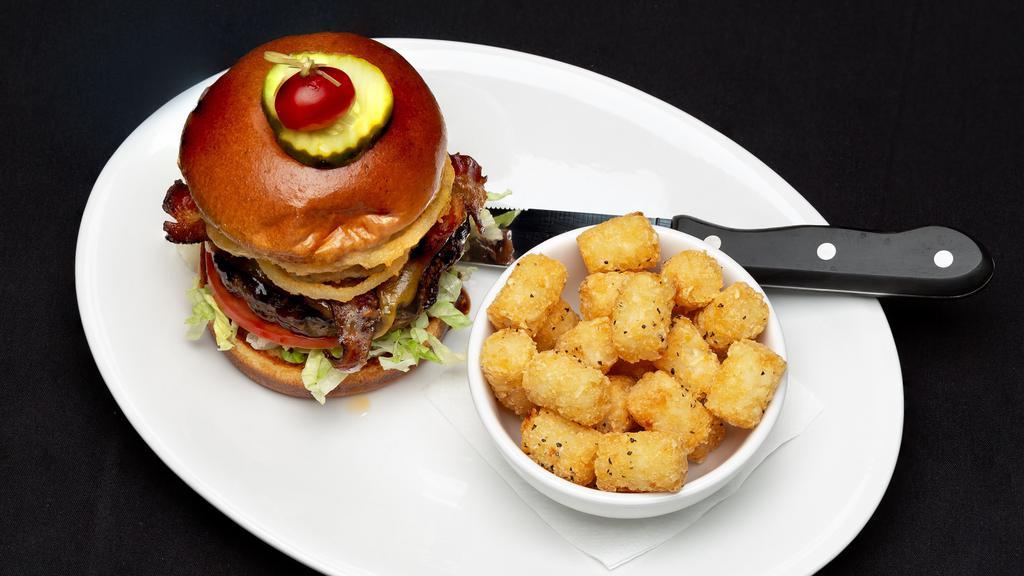 The Triple B · Cherry hardwood smoked bacon, cheddar, bourbon BBQ sauce, onion straws, lettuce, and tomato.

Consuming raw or undercooked meat, poultry, or seafood may increase your risk of food-bourne illness.