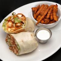 Buffalo Chicken Wrap · Crispy chicken tenders, cheddar, shredded lettuce, celery, ranch dressing, and tossed with b...