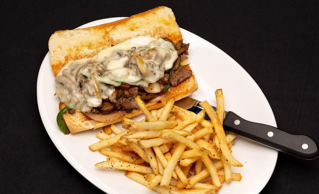 B'S Philly Cheesesteak · Ribeye steak topped with bell peppers, onions, mushrooms, mayo and provolone cheese. Served on a hoagie bun.