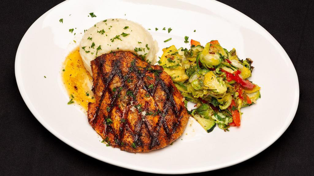 Grilled Salmon · Blackened salmon filet topped with lemon butter and served with mashed potatoes and seasonal vegetables. 

Consuming raw or undercooked meat, poultry, or seafood may increase your risk of food-borne illness.