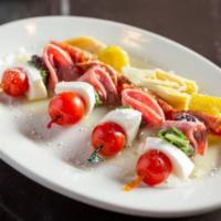 Antipasto Skewers · Salami, fresh mozzarella, pepperoncini, kalamata olives, pepperoni, artichokes, cherry tomat...