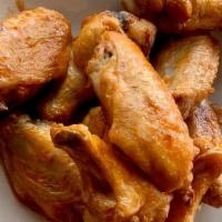 New Orleans Chicken Wings · Baked hardwood smoked wings