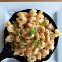 Pork Belly Skillet Mac And Cheese · Cavatappi pasta, pork belly, New Belgium craft, beer cheese, smoked cheddar, toasted panko b...
