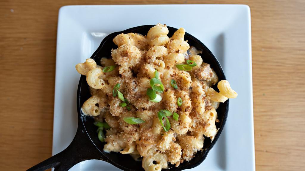 Pork Belly Skillet Mac And Cheese · Cavatappi pasta, pork belly, New Belgium craft, beer cheese, smoked cheddar, toasted panko bread crumbs, green onion