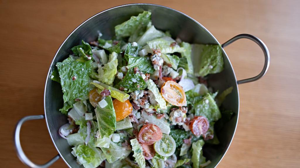 Chopped Blt Salad · Bacon, romaine, baby heirloom tomatoes, crumbled bleu cheese, red onions, cucumber, bleu cheese dressing.
