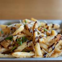Garlic Parm Fries · French fries, garlic parm sauce, parmesan, balsamic glaze, green onion