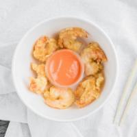 Rock Shrimp Tempura · Deep fried shrimps with special sauce.