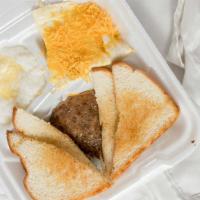 Sausage Breakfast · Served with 2 eggs, grits, toast and jelly.