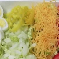 Garden Salad · Lettuce, tomato, cheese, onion, croutons and banana pepper.