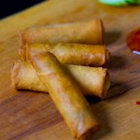 Fried Egg Rolls · Served with sweet chili sauce.