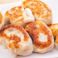Fried Dumplings (6 Pieces) · Pork.