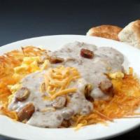 Country Breakfast Bowl · Hash browns topped with three scrambled eggs, sausage, cheddar cheese and country sausage gr...