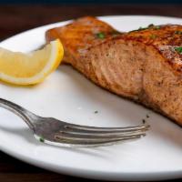 Grilled Atlantic Salmon · Served with potato or rice pilaf, vegetable and dill sauce.
