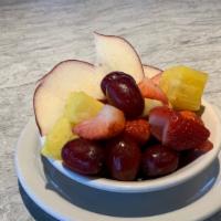 Seasonal Fruit Dish · Vibrant side dish of fruits.