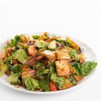 Fattoush Salad · Romaine lettuce, tomato, cucumber, lemon juice, olive oil. Topped with toasted pieces of pit...