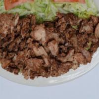 Chicken Shawarma · Sliced chicken meat marinated and seasoned with our special spices. Stacked and skewered. Th...