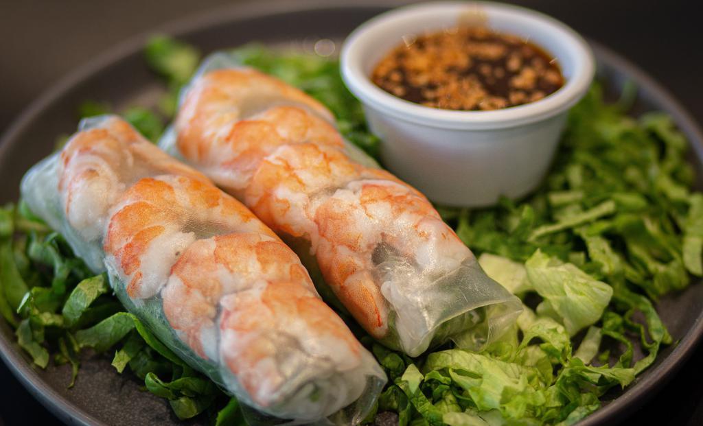 Spring Roll (2 Pieces) · Choice of shrimp, tofu, or avocado. Vermicelli noodles, lettuce, mint, cilantro, and rolled in rice paper with a side of peanut sauce.