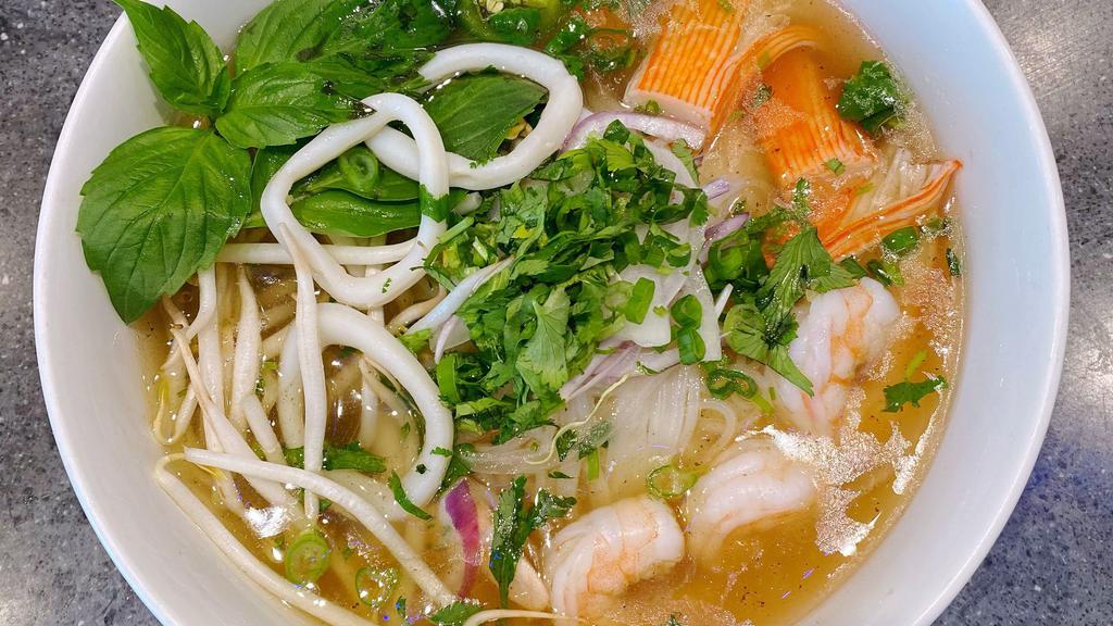 Pho Seafood · Beef broth. Include squid, shrimp, and imitation crab.