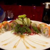 Rainbow Roll · Tuna, white fish, salmon, and shrimp topped on California roll.