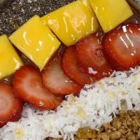 Mango Acai Bowl · topped with granola, coconut, strawberry, mango, chia seeds, & honey.