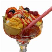 Tutti Frutti Cup · Mango ice cream, lemon ice cream, strawberry ice cream, mixed fresh fruits, and strawberry s...