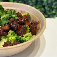 Teriyaki Pork Belly Rice Bowl · Teriyaki poke belly, steamed broccoli, steamed cabbage, steamed rice.