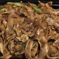 Drunken Noodle · Vegan. Wide size rice noodles stir-fried with bean sprouts, bell peppers, green onion, and e...