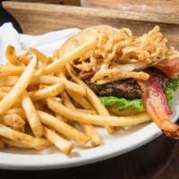 Double Bleu Burger · Smothered in crumbled black river bleu cheese with applewood smoked bacon, creamy bleu chees...