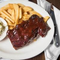 Baby Back Ribs · Our house-rubbed “fall-off-the-bone” loin back ribs, steeped in hard apple cider and slow-ro...