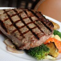 Grilled Ribeye · 14 oz. ribeye grilled to your specifications served with roasted yukon potatoes and seasonal...