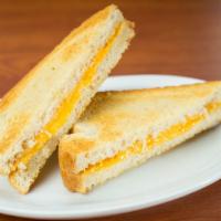 Grilled Cheese · White bread with American cheese served with fries.