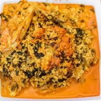 Egusi Soup And Pounded Yam · Nigerian protein melon soup cooked with leafy vegetables and spices served with pounded yam ...