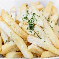 Garlic Parmesan Fries · Amazingly crisp, oven-baked fries coated with freshly grated parmesan and a generous dose of...