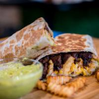 Cali Burrito · Burrito filled with skirt steak, Cheddar and Monterey Jack cheese, guacamole, chipotle aioli...