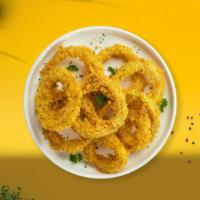 Garden Onion Rings · Sliced onions dipped in a light batter and fried until crispy and golden brown.