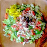 Greek Salad · Tomatoes, lettuce.
cucumbers, black olives and hand
crumbled feta cheese mixed with
olive ol...