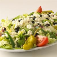 Greek Salad · Lettuce, green peppers, tomatoes, onions, black olives, feta cheese, pepperoncini peppers an...