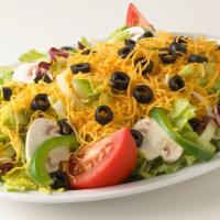 Veggie Salad · Lettuce, tomatoes, green peppers, onions, mushrooms, black olives and cheddar cheese.