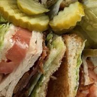 Club Sandwich · With turkey or ham, bacon, lettuce, tomatoes & mayo .