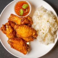 Fried Wings Daddy  · 5 Piece Wings Marinated  Served with Sticky Rice and Special Dipping Sauce
