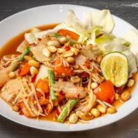Papaya Salad (Tum Muk Hoong) · Spicy Shredded green Papaya, diced tomatoes, Thai chili peppers ,Long bean, Traditional Laot...