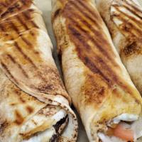 Shish Tawook · Charbroiled marinated chicken breast kabob. With hot bread & garlic sauce