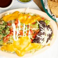 Nachos Locos · Served with Nacho cheese, meat, refried beans, guacamole, lettuce, tomato, onion cream