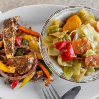 Jerk Chicken · Jamaican jerk chicken cooked to perfection. Add white meat only for an additional charge. Af...