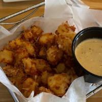 Cheese Curds · WHITE CHEDDAR CHEESE CURDS + CHIVES + BEER BATTER + SRIRACHA RANCH