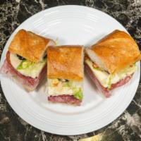 Opb Italian Sandwich · Our Italian is served on our fresh baked Italian bread. Topped with salami, pepperoni, ham a...