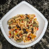 Homemade Pasta Salad - Single · Our homemade traditional pasta salad with zucchini, cherry tomatoes, black olives and colore...
