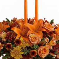 Family Gathering Centerpiece · As your loved ones gather around the table, they'll bask in the warm glow of two orange tape...